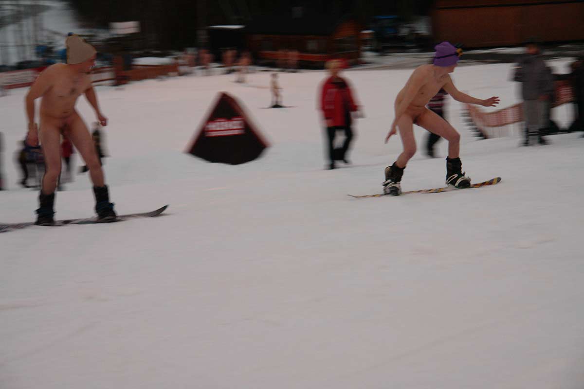 Clothes off festivities - skiing and snowboarding.